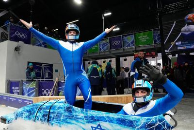 Last at halfway, smiling at the finish: Israel’s first Olympic bobsled run