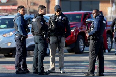 Police respond to reports of multiple people hurt in a shooting at a Rhode Island hockey rink