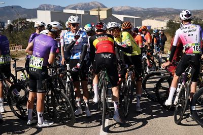 Riders blown off the road as high speed winds disrupt stage racing across Spain