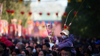 China marks Lunar New Year with temple visits and traditional prayers