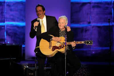 Songwriter behind Madonna and Whitney Houston hits dies aged 75