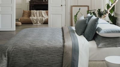 What? This Bedding Expert Says They'd Never Use a Fitted Sheet for a Bed — And That Yours Will Look So Much More "Polished" Without One