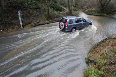 More downpours and snow forecast across UK but temperatures are expected to rise