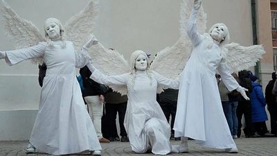 Olympic fans experience Italy's colourful Carnival in Cortina