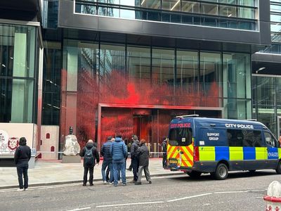 Protesters arrested after City of London building sprayed with red paint