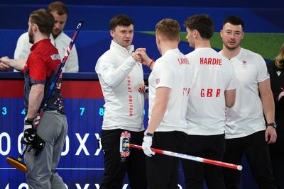 Britain’s men face anxious wait to see if they will make Olympic curling semis