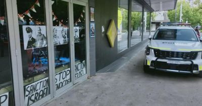 Police seize art posters depicting Trump, Putin and Netanyahu in Nazi uniforms from Canberra bar