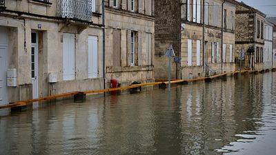 Record rainfall batters western France, flooding triggers red alerts