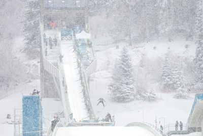 Snowstorm plays havoc with Winter Olympics schedule as multiple events are postponed