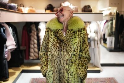 Fur remains a fixture in Cortina, the co-host city of the Winter Olympics, in photos
