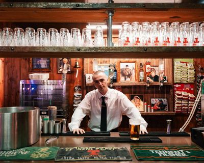 Drinks, darts, DJs and drag queens: the artwork that’s a fully-functioning pub – with the artist pulling pints
