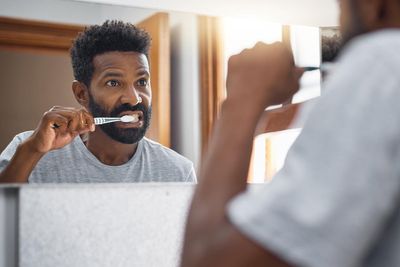 You’re probably brushing your teeth wrong – these changes could save your life