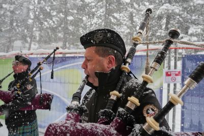Bagpipers play at Olympic curling in homage to sport's Scottish heritage — but they're Italian