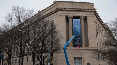 A terrifying Trump banner at the DOJ shatters all pretense of impartiality
