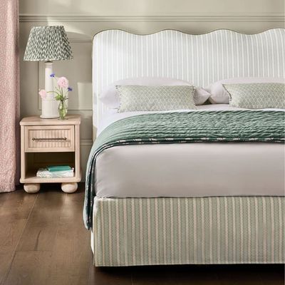 This striped Next ottoman bed nails every 2026 bedroom trend going – and it can double the storage space in a small bedroom