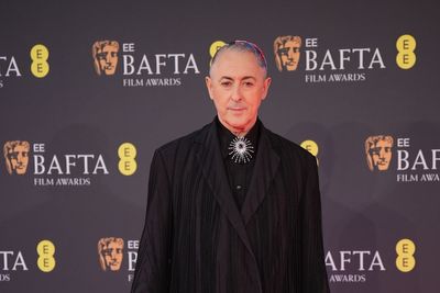 Stellan Skarsgard, Warwick Davis and Alan Cumming lead early Bafta arrivals