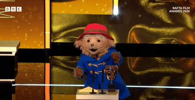 Paddington covers Bafta in marmalade as he presents ‘sticky’ trophy