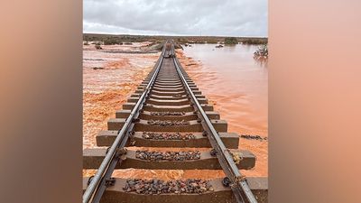 Rail link cut, shelves stripped as floods swamp outback