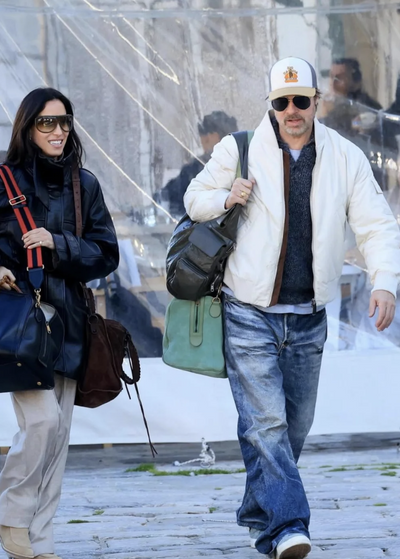 Inside Brad Pitt and Inés de Ramón's Opposing Travel-Friendly Fashion and Celebrity Style Moments