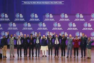 Inside India’s AI Impact Summit: Robot fraud, gridlocked roads, a shirtless protest, and AWOL Bill Gates