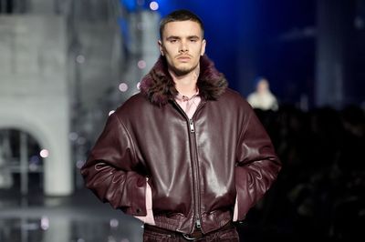 Romeo Beckham hits the catwalk for London Fashion Week after 'scathing swipe' at Nicola Peltz