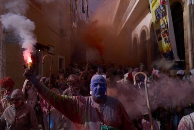 A colorful 'flour war' in Greece marks the start of Lent, in photos