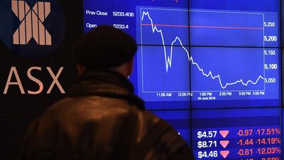 Aussie shares edge lower but metals continue charge