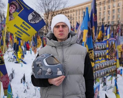 ‘I want to come back, to win gold’: banned Ukrainian determined to race for glory in helmet of memory