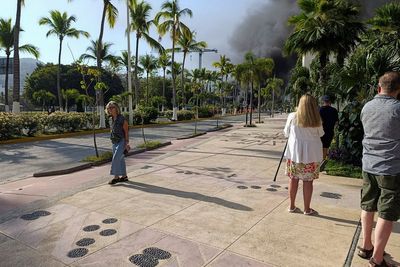 Flights finally resume from violence-hit Mexico resort after thousands stranded
