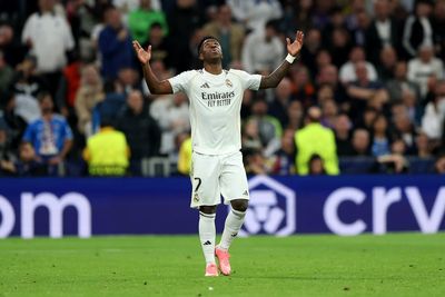 Real Madrid 2-1 Benfica (3-1 agg.): Vinicius Jr on target as subpar Los Blancos reach last 16