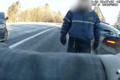 Horrifying moment car loses control on icy road and plows into state trooper