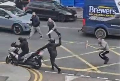 Broom-wielding hero takes on machete robbers in jewellery store raid