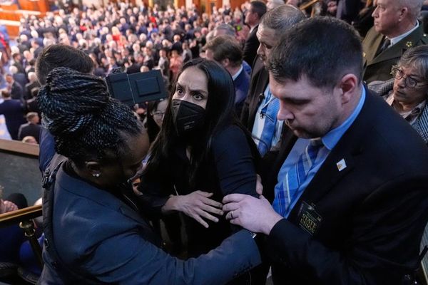 Ilhan Omar guest arrested for standing at Trump’s State of the Union address