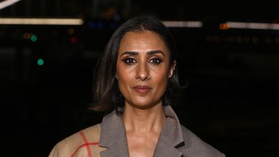 Scarves are everywhere this season, and Anita Rani's artfully draped Burberry design gave her oversized suit a fresh spin
