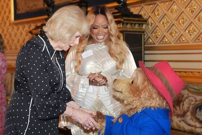 Queen meets Paddington Bear as pair share marmalade sandwiches