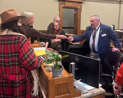 Political storm in Wyoming as far-right activist caught handing checks to lawmakers