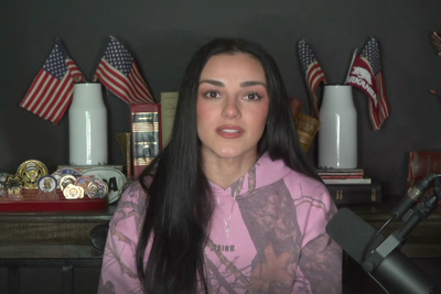 Kash Patel’s country music girlfriend breaks silence on him chugging beer with USA hockey team as FBI was ‘providing security’ at Olympics