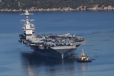 US military builds up the largest force of warships and aircraft in the Middle East in decades