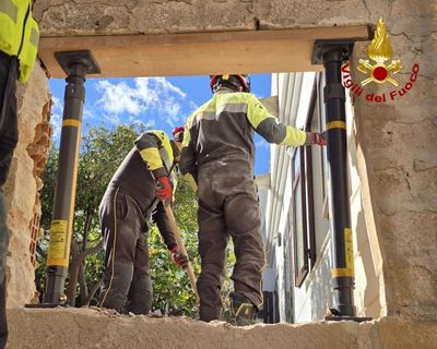 Firefighters in Sicily rescue 400 rare library books from precipice after landslide