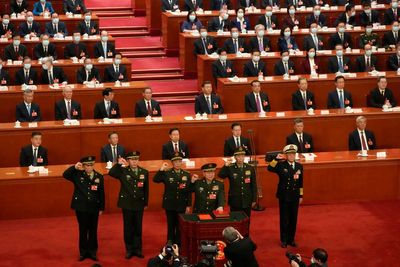 19 deputies of China's legislature, including 9 military officers, removed before annual meeting