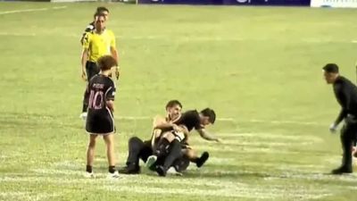 Lionel Messi Shockingly Wrestled to the Ground by Fan in Wild Puerto Rico Friendly