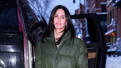 Courteney Cox proves cold weather is no match for her sleek khaki puffer and jeans outfit