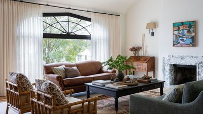 This 1928 Silver Lake Tudor Revival Reclaims Its Character With Bold Wallpaper, a 30-Foot Library Wall, and an Antique Desk Filled With Secret Love Letters