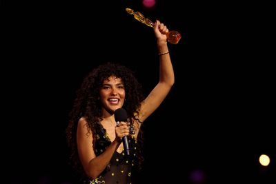 Olivia Dean preaches ‘the art of loving’ at Brit Awards ceremony plagued by censorship and dodgy jokes