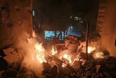 Israel launches deadly strikes on Beirut after Hezbollah fires missiles across border