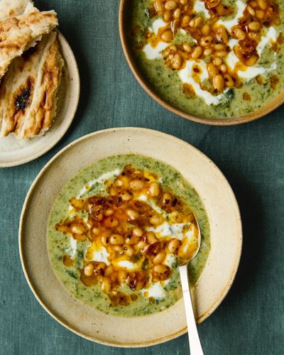 Rukmini Iyer’s quick and easy chard borani soup with yoghurt, crispy garlic and beans – recipe