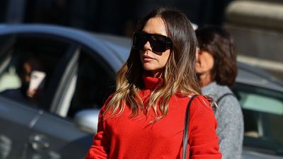 Victoria Beckham always looks chic, but a pillar box red roll neck and camel flared trousers has to be one of her best ever combinations