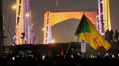 Iraqi police fire tear gas at pro-Iran protest near US embassy in Baghdad