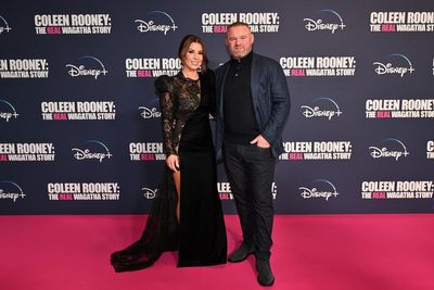 Coleen Rooney steps out without wedding ring after husband Wayne was seen partying with two mystery women