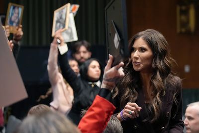 Kristi Noem’s Senate hearing thrown into chaos by protesters hurling insults at DHS boss